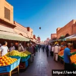 Home 22 여행 중 촬영할 사진 아이디어 - A vibrant low-angle shot of a bustling urban street market in Marrakesh during mid-morning, focusing...